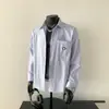 Camisa Masculina de Manga Longa Listrada 2026 Outono Nova Estilo Coreano Casual Top Solto Estilo Médio-Longo Camisa Top de Temperamento