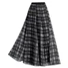Falda de retazos a cuadros reversible para mujer, nueva falda de cintura alta con corte en A adelgazante para otoño/invierno 2026, falda elegante y versátil