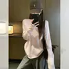 Suave top de punto coreano rosa con puños, de manga larga para mujer, otoño e invierno, suave y pegajoso, lechoso, holgado, perezoso, jersey
