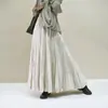 Saia Midi Plissada de Chenille com Barra Larga Outono/Inverno 2026 Feminina Cintura Alta Fluida Linha A Comprimento Médio Cobre os Quadris Afunilada Saia Guarda-Chuva