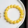 Pulsera de flor flotante fluorescente de segunda generación, color amarillo aceite de pollo cera de abeja, pulsera de ámbar salada flotante, regalo de actividad para hombres y mujeres
