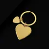 Llavero de acero inoxidable con forma de corazón hueco con grabado láser e impresión a color UV, llavero de metal material en blanco