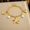 Pulseira com Pingente de Vida Marinha Banhada a Ouro em Aço Inoxidável, com Pérolas, Estrelas-do-Mar, Conchas e Acessórios de Búzio para Mulheres - Best Seller Transfronteiriço