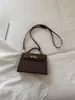 Bolso de Hombro Único con Textura de Alta Calidad para Mujer 2026 Nuevo Pequeño de Nicho Moda Bolso de Mano Simple Bolso Cruzado de Gran Capacidad