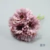 Simulação de gerbera flores amarradas à mão mesa da sala de estar layout de mesa de sobremesa grinalda fazendo decoração de cena de shopping