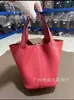 Venta Directa de Fábrica Togo Cuero de Grano Superior Bolso Cesta Moda Femenina Bolso Cubo Versátil Simple Cuero Genuino Bolso de Mujer