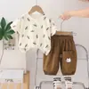 Traje de Verano para Niños 2025 Nuevo Ropa Casual de Dos Piezas de Manga Corta para Niños Bebé Moda de Comercio Exterior