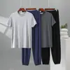 Nuevo traje casual de seda helada para hombre de verano, pantalones jogger de manga corta de verano, talla grande y holgada