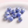 Dulces brillantes dibujos animados lindos cerámica colorido garra de gato con cuentas diy aretes tocado pulsera accesorios de joyería al por mayor