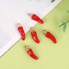 Colgante de gota de aceite de chile rojo divertido japonés y coreano Accesorios de joyería de aleación DIY Accesorios para el cabello Cuerda para la cabeza Colgante de llave Venta al por mayor