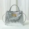 Bolso tote de diseño de nicho de moda, nudo metálico, tejido de cuero, hombro, portátil, gran capacidad, piel de vaca, bolso para mujer