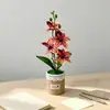 Quatro orquídeas Phalaenopsis artificiais estilo nórdico em vasos de tecido, flores artificiais e plantas verdes para bonsai de mesa, adereços de fotografia e itens decorativos