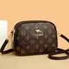 Bolsas de Alta Gama para Mujer 2025 Nuevas Bolsas Cruzadas para Mujer Estilo Coreano Modernas Versátiles de un Solo Hombro Madre de Mediana Edad Bolso Redondo Pequeño