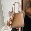 Bolso tipo cubo casual transfronterizo para mujer 2025 nuevo bolso bandolera simple de gran capacidad bolso de hombro sencillo y a la moda para ir al trabajo