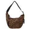 Bolso de mujer tipo dumpling de moda, bolsa versátil de tela popular deportiva casual, bolso pequeño portátil de hombro y cruzado a la moda