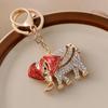 Llavero de coche con elefante incrustado en diamantes de estilo tailandés, colgante de bolso de animal de dibujos animados, accesorios de metal, pequeño regalo creativo al por mayor