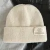 Chapéu de Tricô Estilo Coreano Outono e Inverno Versátil Novo para Mulheres Chapéu de Lã Espesso à Prova de Vento com Proteção para Orelhas Chapéu Quente para Frio