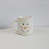 Jingdezhen Lindo Dibujo Animado Cara Sonriente Pequeño Muñeco de Nieve Taza de Agua Cerámica Estilo Ins Hogar Desayuno Niños Taza de Leche Café