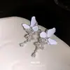 Danza de Mariposas y Luz Fluida~Aretes de Borla de Zirconia con Mariposa de Esmalte Blanco, Aretes de Alto Nivel Estilo Hada Francesa con Diseño de Nicho