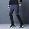 Fabricante Direto Calças Casuais de Primavera e Outono para Homens, Calças Esportivas Versáteis da Moda Slim Fit, Calças Largas Elásticas de Secagem Rápida