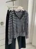 Sudadera con capucha de punto a rayas, mezcla de lana al 60% estilo coreano, otoño 2026, casual y estiliza, chaqueta cárdigan de punto con doble cremallera