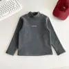 Valle del Viento 2026 Invierno Nuevo Estilo Coreano Elegante Cuello Alto Medio Estampado de Letras Camiseta Base Cálida Versátil Ropa Interior para Niños