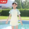 Traje de baño infantil mujer conservador protección solar conjunto de tres piezas verano nuevo bebé dividido secado rápido deportivo ins natación al por mayor