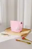 Bolsa de maquillaje simple a rayas bicolor, portátil y artística, adecuada para viajes, almacenamiento de productos para el cuidado de la piel, bolso de mano, bolsa tipo almohada