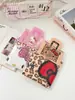 Bolsa de Compras Auténtica Autorizada Serie Familiar Sanrio Hello Kitty Estampado de Leopardo Plegable Portátil Bolsa de Gran Capacidad Estilo Nuevo