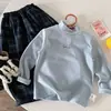 Ropa interior térmica de cuello medio alto para niños Bangcheng 2026 Invierno Nueva Ropa interior cálida autocalentable suave pegajosa para niños Tendencia Venta al por mayor