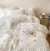 Juego de cuatro piezas de seda de hielo de verano, sábana y edredón de tencel lavado de alta gama, ropa de cama de tacto fresco, nuevo estilo 2025