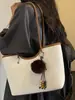 Bolso tote nuevo estilo coreano con estampado de leopardo para principios de otoño de 2026, bolso de hombro de gran capacidad para el trabajo y los desplazamientos, bolso de mano simple y único