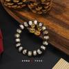 Pulsera de esmalte gris fragante de estilo antiguo de Yong Lao Qin para una familia de tres animales tragadores de oro con color de esmalte de color pulsera de corte