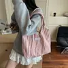 Bolsa de Lona Feminina 2025 Nova Popular Moda de Verão Estudante Aula Trabalho Roupas Bolsa de Ombro Grande Capacidade Bolsa Tote