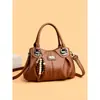 Bolsas femininas transfronteiriças 2026 novo modelo bolsa tote de grande capacidade versão coreana bolsa de ombro versátil para mães de meia-idade bolsa transversal
