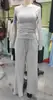 2026 Nuevo Otoño Transfronterizo Europeo y Americano Amazon TK Más Vendido Color Sólido Casual Conjunto de Manga Larga Top y Pantalones de Pierna Ancha
