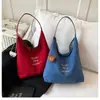 Bolsa de Moda Transfronteiriça Feminina Casual Grande Capacidade Leve Portátil Bolsa de Lona Estudante para Ir ao Trabalho Coreana de Nicho Bolsa Tote
