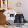 Conjunto Casual de Verano para Niños 2026 Nuevo Estilo Conjunto de Shorts de Manga Corta con Bolsillos para Niños Conjunto Elegante de Dos Piezas para Bebés y Niños