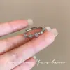 Anillo delgado dulce de capas para mujer, anillo abierto en forma de corazón exquisito y versátil, anillo de dedo índice moderno de alta gama estilo ins