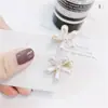 Horquilla francesa retro con forma de margarita y perla, con clip pequeño, estilo mini horquilla, accesorio coreano para el cabello para mujer