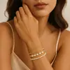 Conjunto de Pulseiras Europeias de Moda em Cobre Banhado a Ouro 14k com Pérolas para Mulheres Design Exquisito Versátil Senso de Moda Joias de Mão