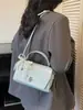 Bolsa de Mão Nicho Estilo Coreano Bolsa Baguete para Mulheres Novo Modelo Primavera 2026 Bolsa de Ombro Transversal Stylish de Luxo Leve