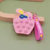 Nuevo Producto en Stock Cartera Creativa de Silicona con Forma de Dona Llavero Lindo de Dibujos Animados para Niños para Aliviar el Estrés Mini Bolso Cruzado
