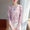 Elegante y estilosa camiseta de malla de manga larga para mujer, nuevo modelo de verano 2026, disimula el vientre y estiliza, con detalles de encaje