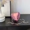 Bolso popular de este año 2026 principios de otoño nuevo bolso para mujer elegante bolso de hombro único con cadena bolso cruzado mini de corazón moderno