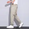 Loja de outlet de comércio exterior calças casuais cropped masculinas primavera-verão para pessoas de baixa estatura, calças retas slim fit ligeiramente afuniladas, calças longas finas, calças masculinas de 9 pontos