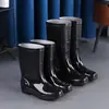Botas de lluvia para hombre, venta al por mayor, zapatos de protección laboral, zapatos antideslizantes impermeables, botas de lluvia, zapatos altos de goma, botas de agua, zapatos de agua con terciopelo de algodón, resistentes a ácidos y álcalis.