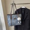 Bolsa Tote Grande de Couro Sintético Vintage para Mulheres 2026 Nova Moda Texturizada Bolsa de Ombro Simples Popular para Trabalho e Deslocamento