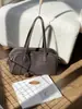 Bolsa de bowling de piel de becerro de capa superior, bolso de mano de cuero genuino, nuevo bolso de mano de otoño e invierno, bolso de hombro para viaje, bolso Boston