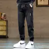 Jeans Masculino da Moda Tendência Outono e Inverno 2025 Novo Quente Casual Largo Harem Marca Calça Jogger